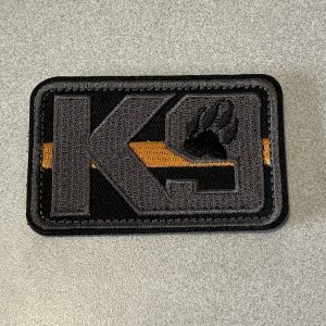 K9 thin orange line badge